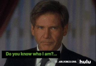  An animated gif of Harrison Ford, in the film  Air Force One , saying “Do you know who I am? I’m the President of the United States.” 
