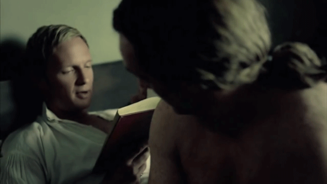Animated gif from Black Sails of Thomas reading to James