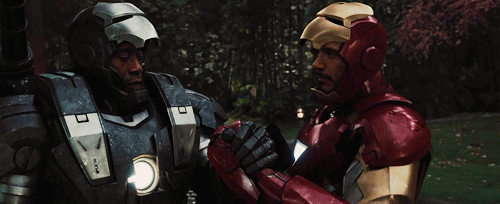 Animated gif of Rhodey and Tony in Iron Man suits