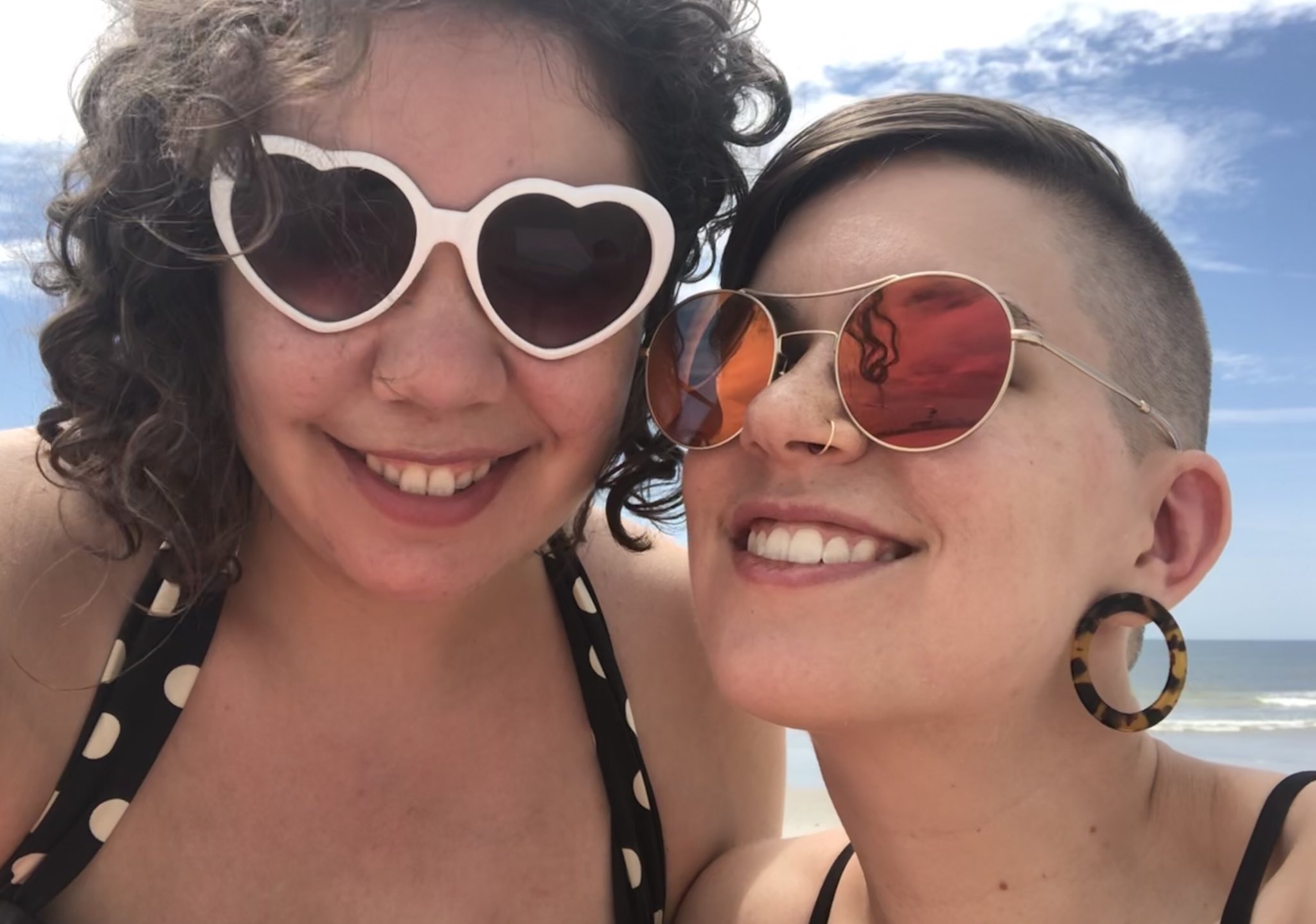  Elizabeth and Flourish, wearing sunglasses at THE BEACH. 