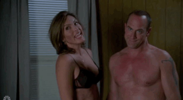 Animated gif of Detectives Benson (in a bra) and Stabler (shirtless) hugging suggestively.