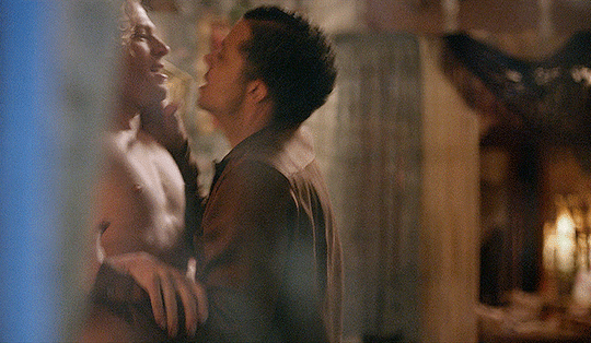 Animated gif of Louis and Lestat angrily kissing