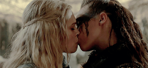  An animated gif of Clarke and Lexa, from  The 100 , kissing. 