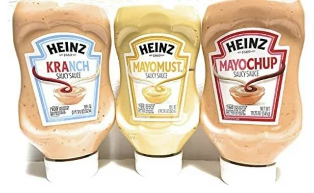 Image of three squeeze bottles of Heinz's mixed condiments: KRANCH, MAYOMUST, and MAYOCHUP