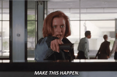 Animated gif of Scully looking livid and pointing with the caption "MAKE THIS HAPPEN."