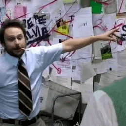 Animated gif of the iconic Always Sunny in Philadelphia scene where Charlie is ranting in front of a conspiracy theory wall of papers and Mac looks confused.