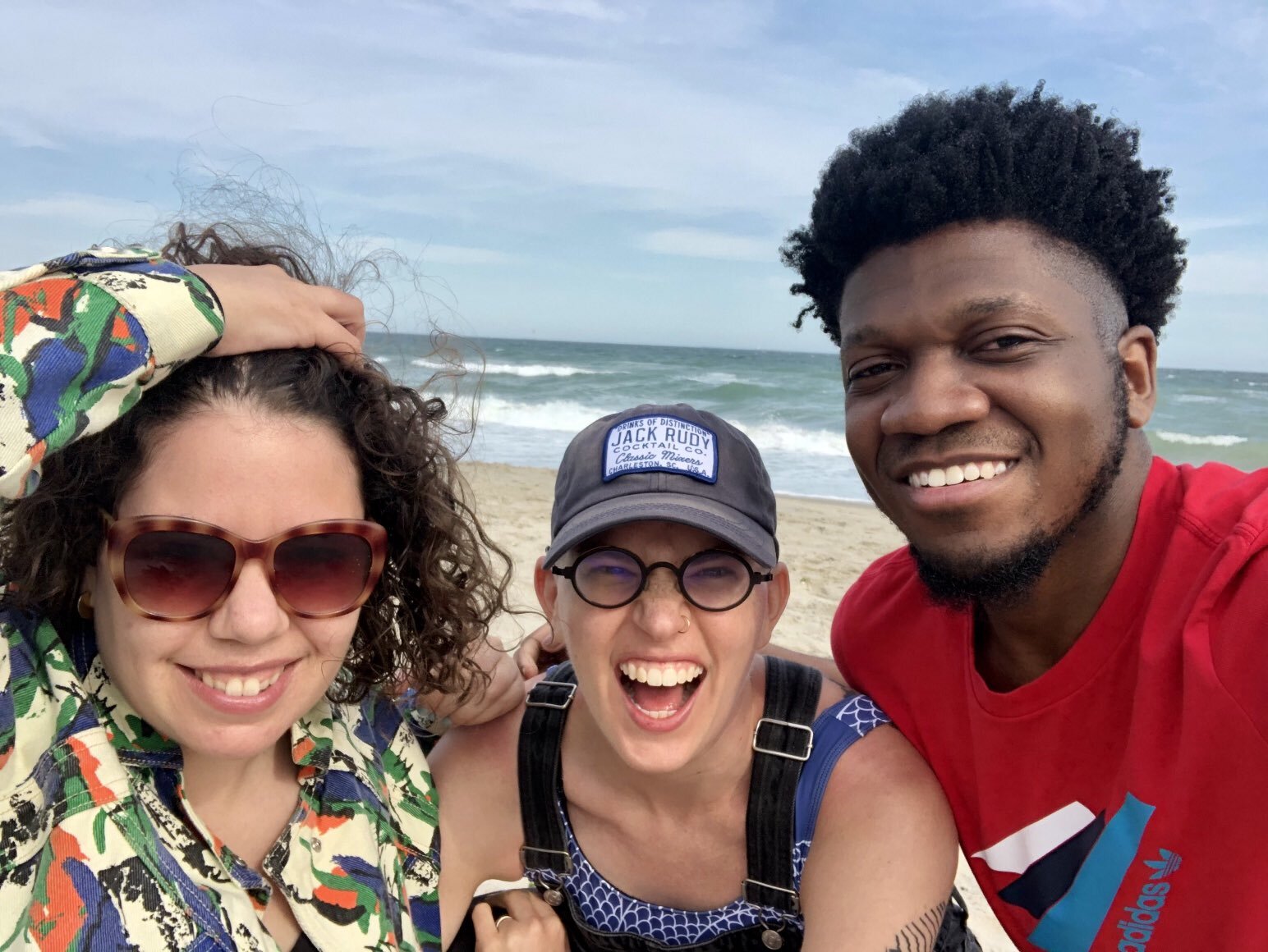  Elizabeth, Flourish and Para grinning on a beach 