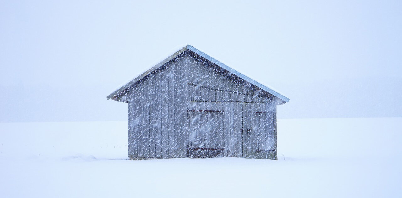  A (possibly Canadian) shack in a snowstorm. 