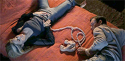  A gif from the movie Existenz featuring people…attached to a fetus with umbilical cords? Hard to describe. 