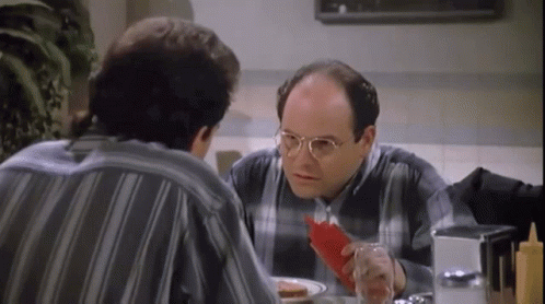 Animated gif of Jerry and George at the diner in Seinfeld. George accidentally squirts a ketchup bottle and then covers his mouth with his hand.