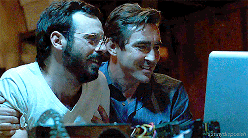 Animated gif of Gordon and Joe from Halt and Catch Fire grinning at a computer