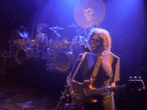  The Grateful Dead, playing guitar as skeletons. 