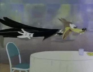 An animated gif of the "awooga wolf" wearing a tuxedo and pounding a table as they howl.