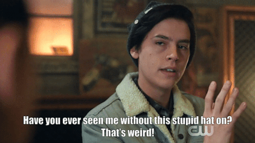  An animated gif of Jughead Jones from Riverdale saying “Have you ever seen me without this stupid hat on? That’s weird!” 