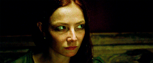  An animated gif of Anne Bonny, from  Black Sails , staring intensely at something off-screen. 