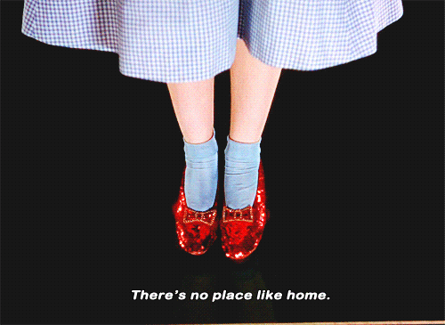 An animated gif of Dorothy, from  The Wizard of Oz , clicking her ruby slippers together. Caption: “There’s no place like home.” 