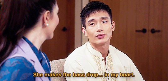  An animated gif from  The Good Place : Jason says “She makes the bass drop… in my heart” to Janet. 