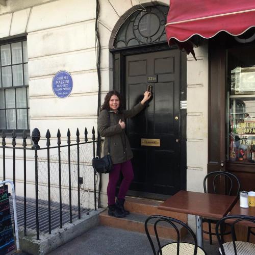  Elizabeth knocking on the door of 221B Baker Street. 