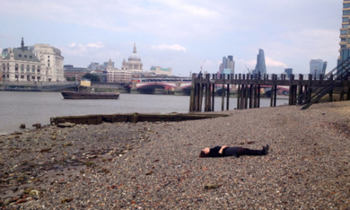  Elizabeth lying on the beach, as in  Sherlock.  