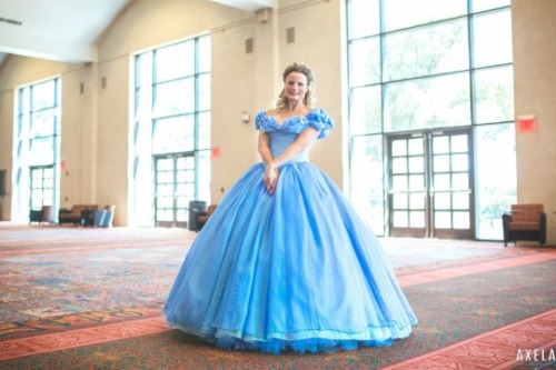  Teresa dressed in the pale-blue ball gown from the recent live-action  Cinderella  movie, posing in a convention hallway. 