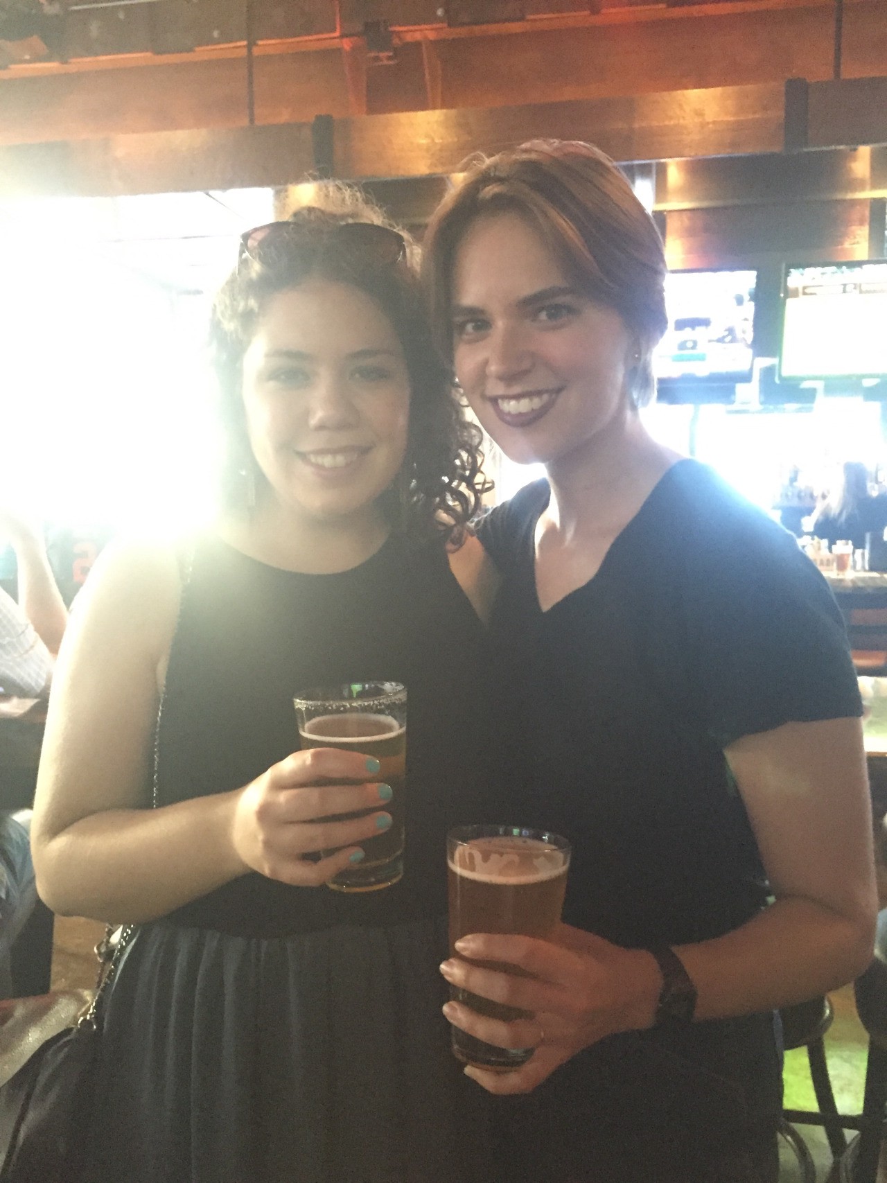  Flourish and Elizabeth raise beers at San Diego Comic Con. 