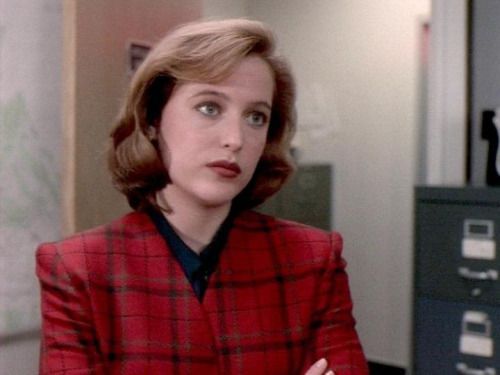 Dana Scully, in an early season of  The X-files,  wearing red plaid. 