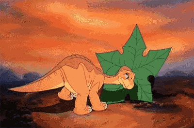 Animated gif of baby dinosaur Littefoot resting on a tree star leaf