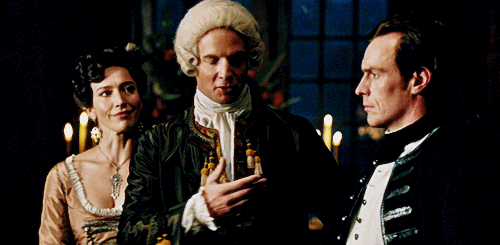 Animated gif of Thomas Hamilton gesturing at James McGraw, Miranda behind him smiling.