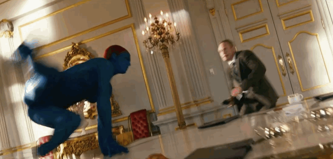 Animated gif of Mystique rotating on a table and kicking a man