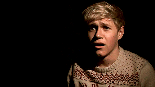 Animated gif of Niall from 1D looking upset