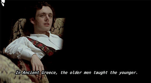  Michael Sheen as Robbie Ross saying “In Ancient Greece, the older men taught the younger.” 