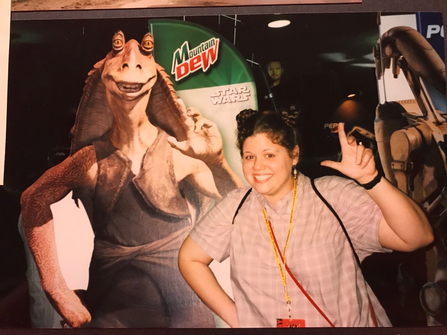  Rainbow poses with a Jar Jar Binks standee. 