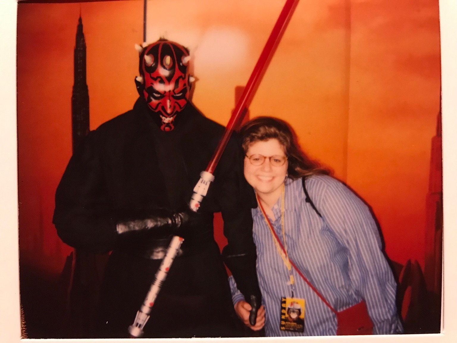  Rainbow poses with a Darth Maul standee. 
