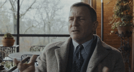 Gif of Benoit Blanc: “It makes no damn sense…it compels me though!” 