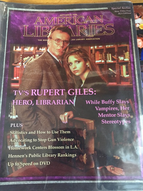  A cover of  American Libraries  magazine, with Giles and Buffy in a library. 