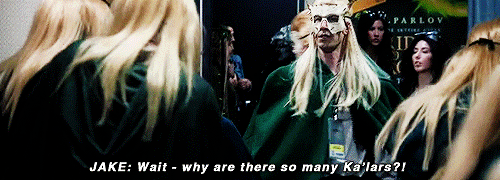  A gif. Jake, dressed as an elf, says “Wait - why are there so many Ka’lars?!” Terry replies, “Costume contest just ended.” 