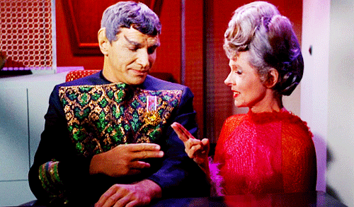 A gif in which Sarek and Amanda, from Star Trek, share a Vulcan finger kiss.