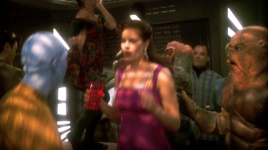 Animated gif of Jadzia Dax dancing.