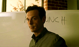 Animated gif of Joe and Gordon in the final season of HACF, with Gordon in front of a board that says RELAUNCH
