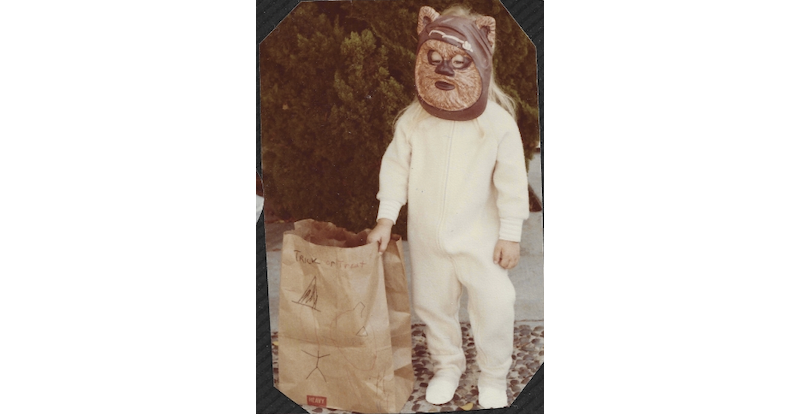 Photograph of Tessa at age 4 wearing an ewok costume.