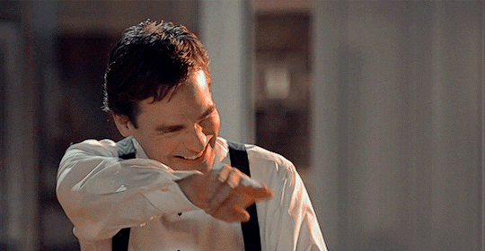 Animated gif of House's Dr. Wilson pumping his fists as he cheers.