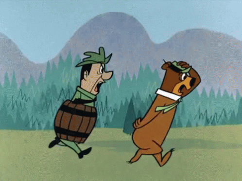 Animated clip from The Yogi Bear Show of Ranger Smith and Yogi running in a chase