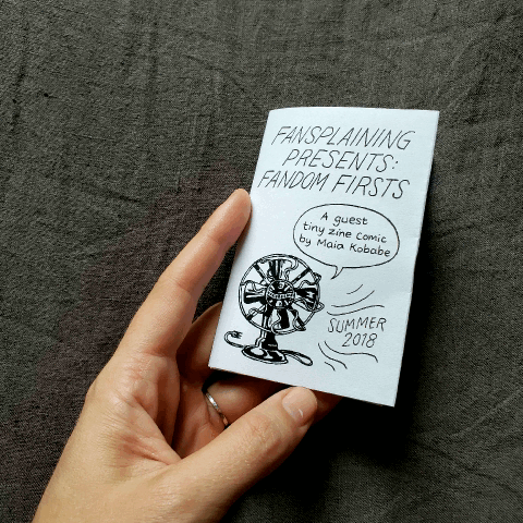 Animated gif of a Fansplaining Tiny Zine being opened and shut