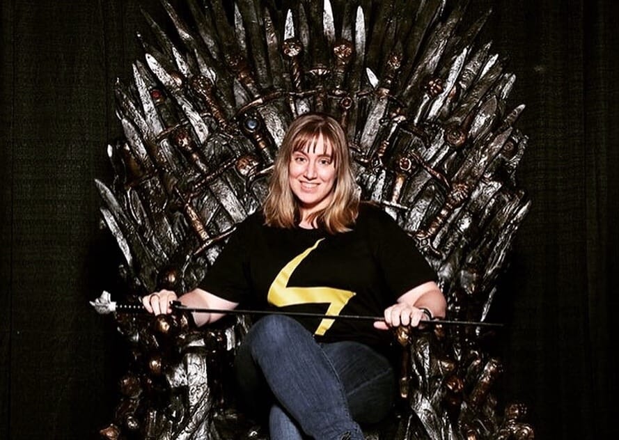 Photograph of Michelle sitting on the iron throne