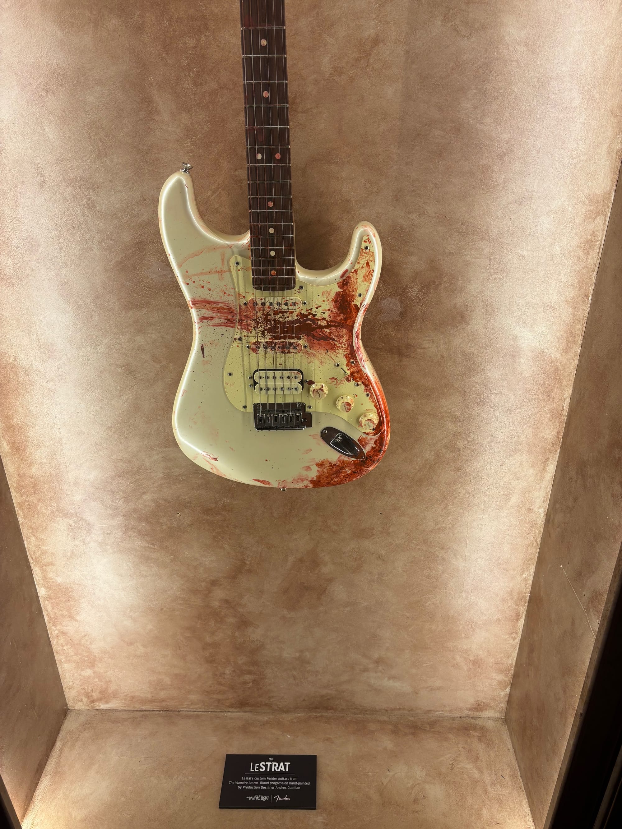 Image of a blood-stained guitar
