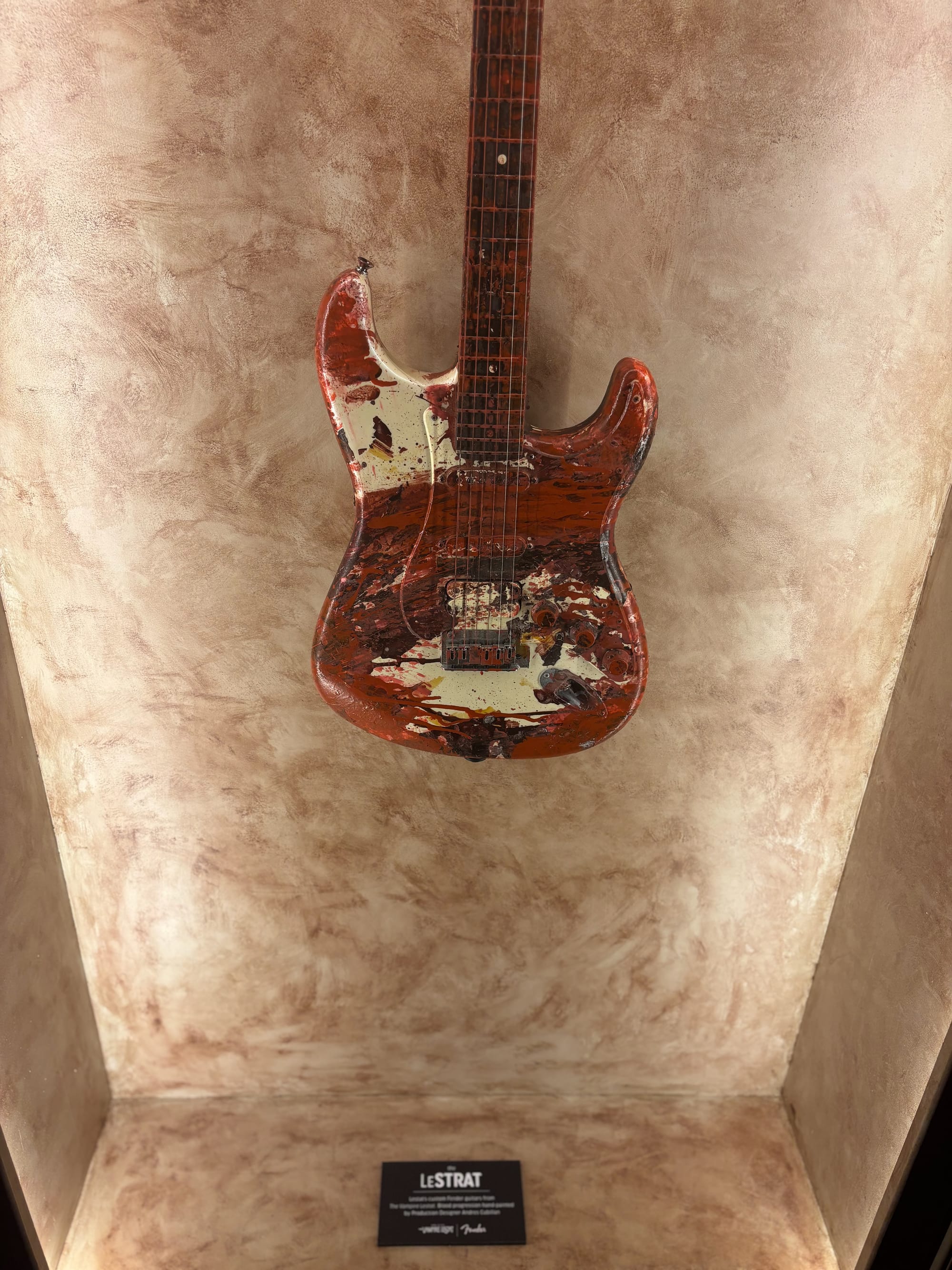 Image of an even more blood-stained guitar