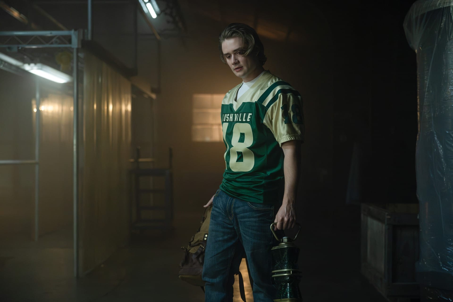 Production still of Noah in his Rushville football jersey.