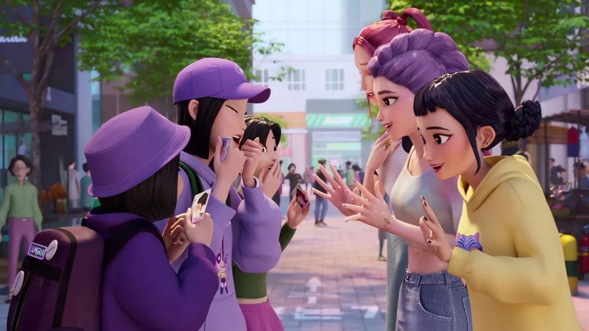 Image from Kpop Demon Hunters featuring three fans (mostly dressed in purple) directly facing the three members of the trio.