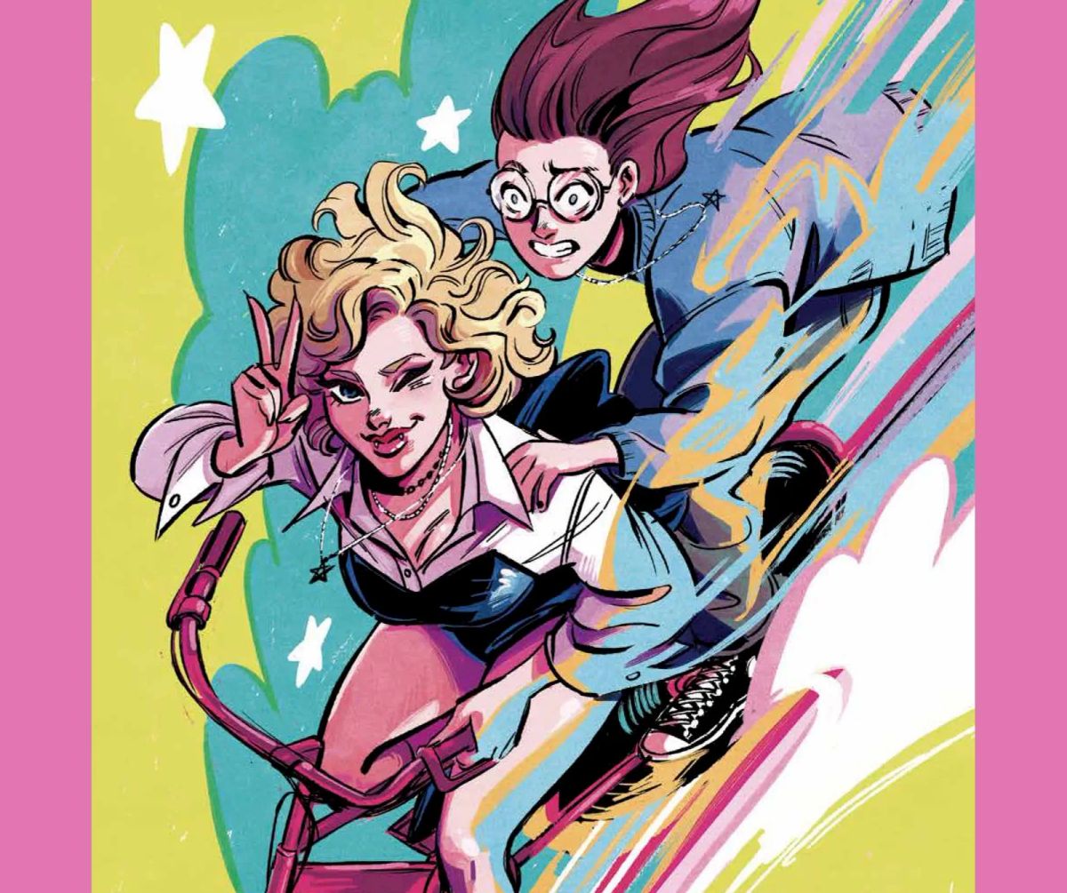 Image from the back of issue one of Mary Sue, featuring Jessica the blonde vampire riding a bicycle, with Cassie (glasses, long brown hair) hanging on to the back, looking panicked.