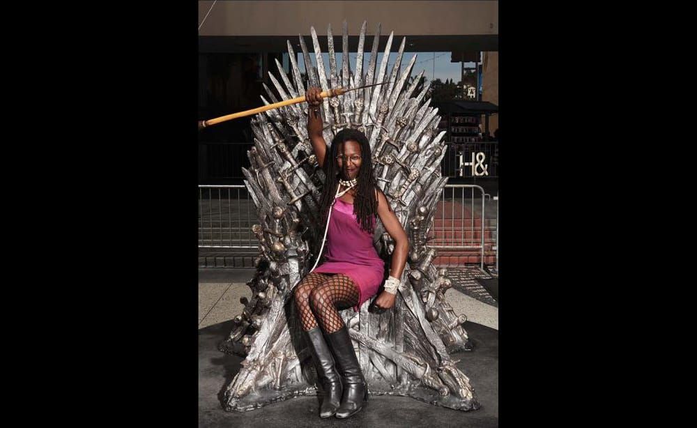  Pam Noles sits on the Iron Throne. 